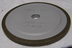 REBOLO DIAMANTADO DE 100 MM DI�METRO E BORDA ABRASIVA DE 10 MM de ESPESSURA E 5 MM ALTURA- FURO �